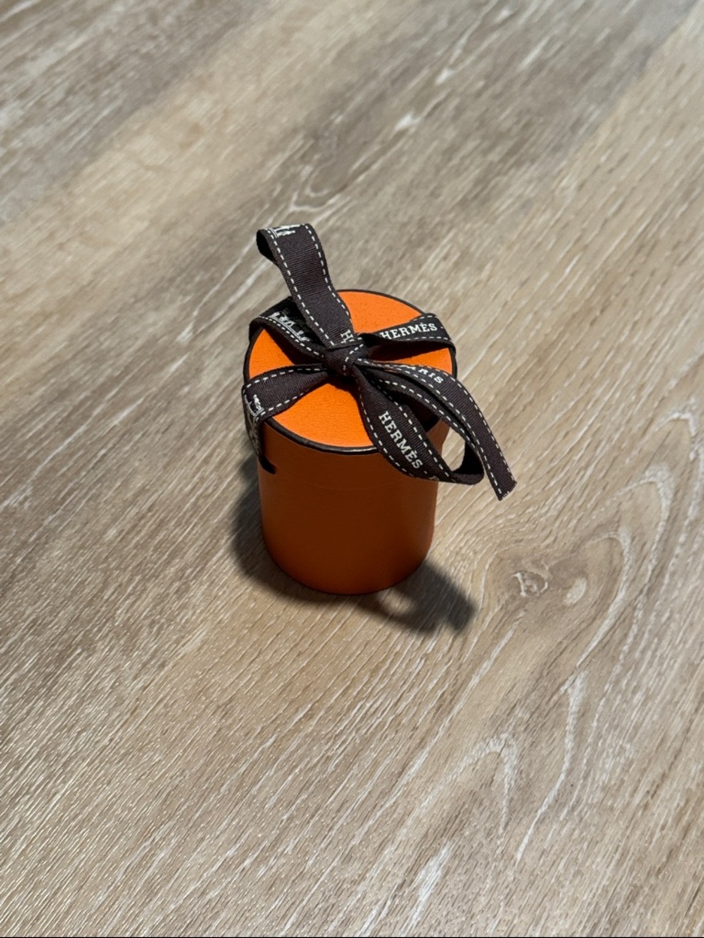 Hermès Orange Round Gift Box with Brown Ribbon